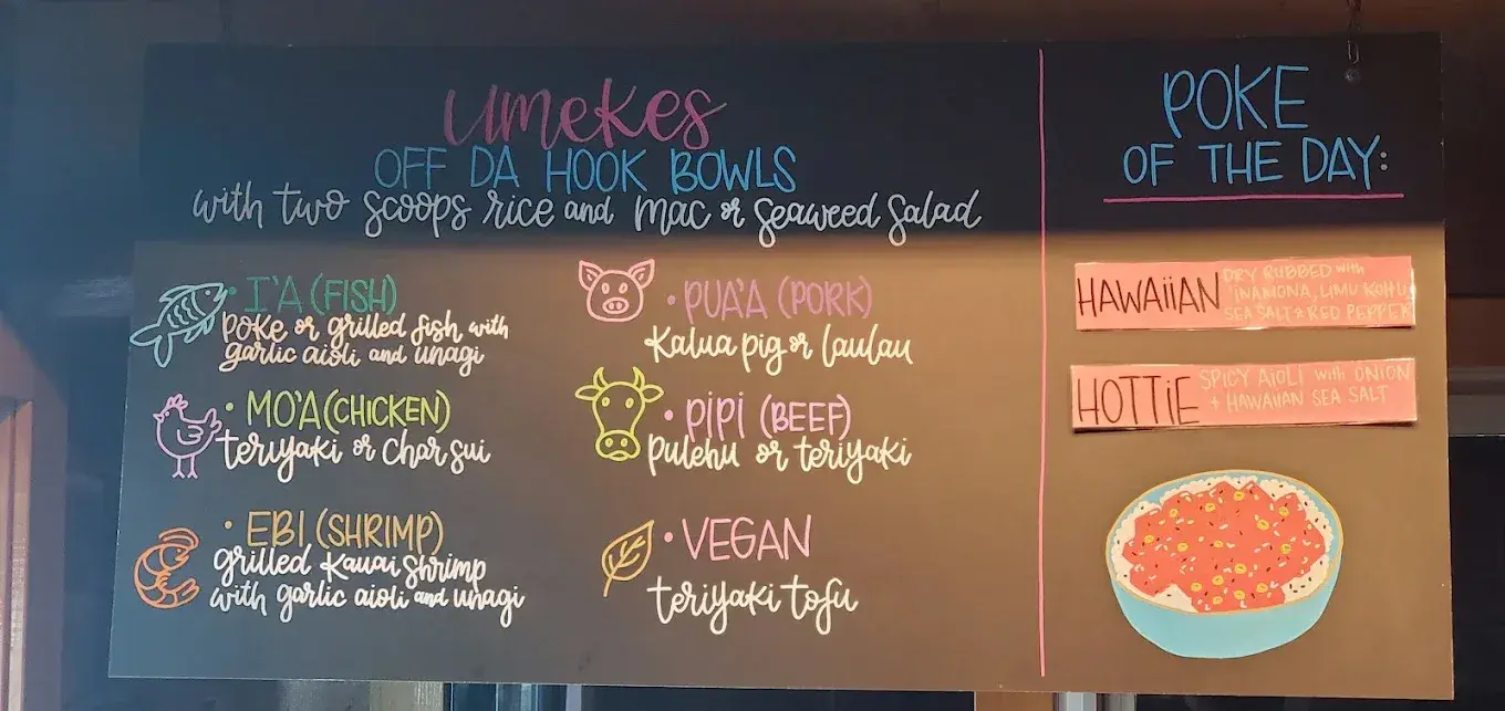 The hand-lettered Off Da Hook Bowls chalkboard at Umekes Saddle Stop