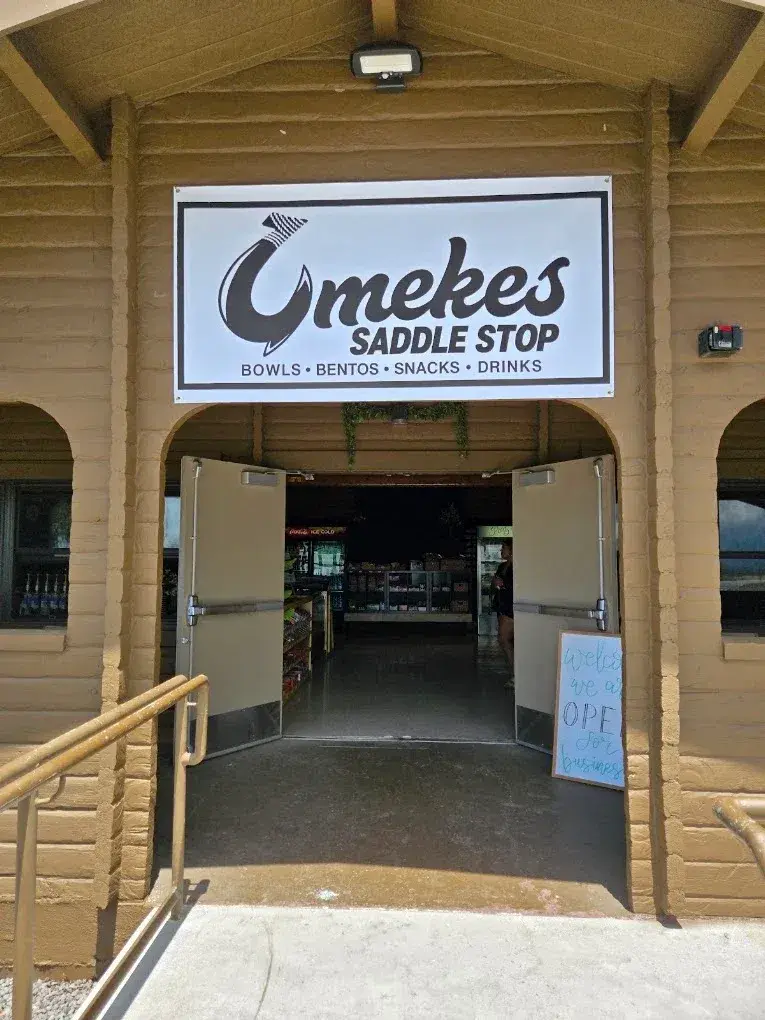 The Umekes Saddle Stop sign over the entrance on Saddle Road